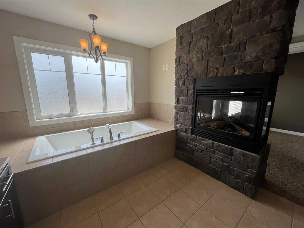 295 Sixmile Ridge South, Lethbridge, AB - Indoor With Fireplace