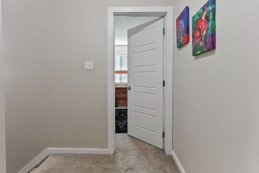 2-1180 Keystone Road West, Lethbridge, AB - Indoor Photo Showing Other Room