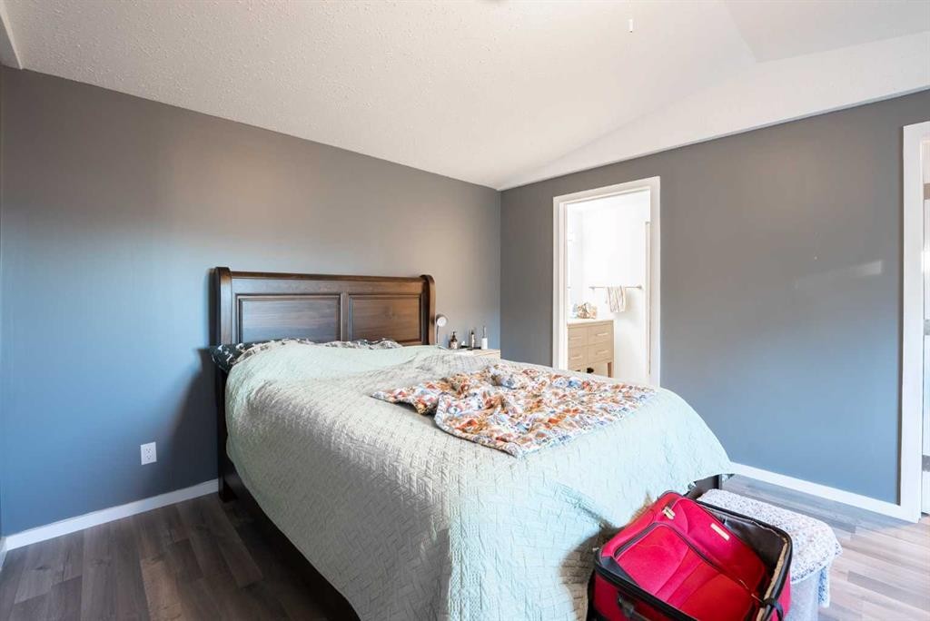 42 Westover Crescent, Claresholm, AB - Indoor Photo Showing Bedroom