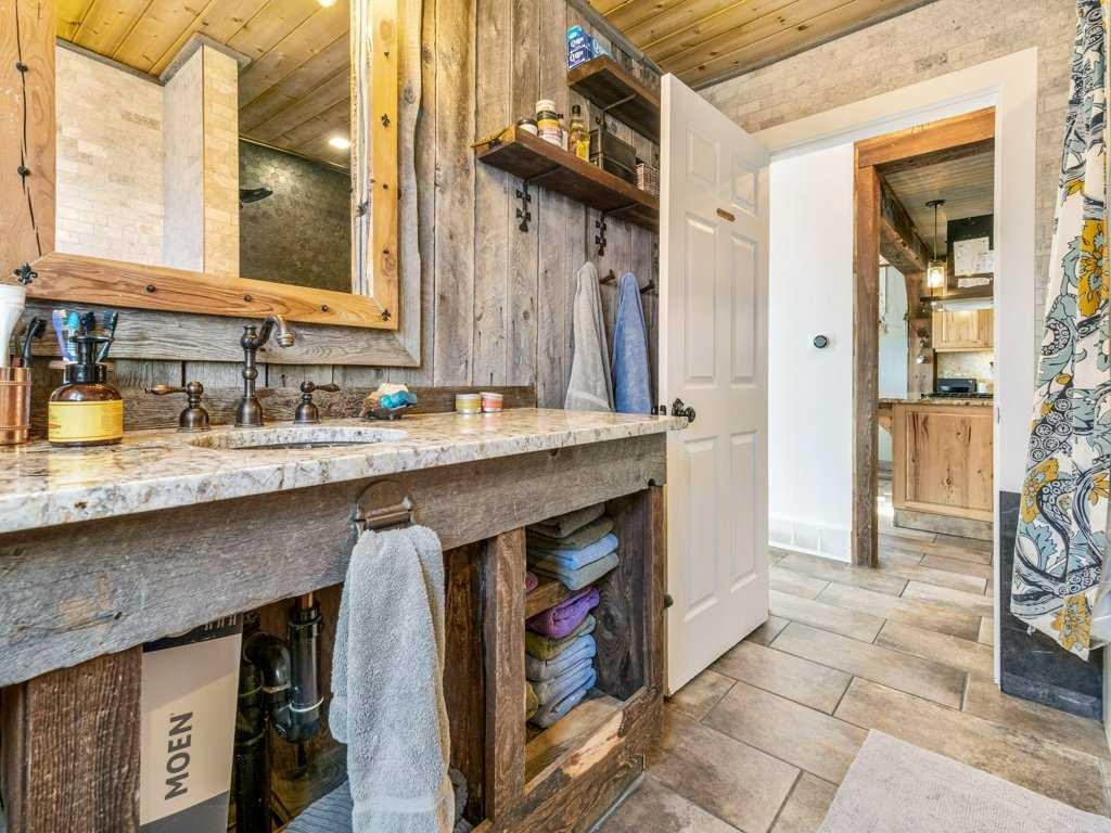 6501 22 Avenue, Coleman, AB - Indoor Photo Showing Other Room With Fireplace