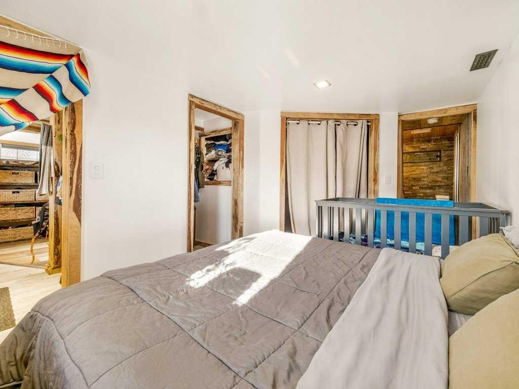 6501 22 Avenue, Coleman, AB - Indoor Photo Showing Bedroom