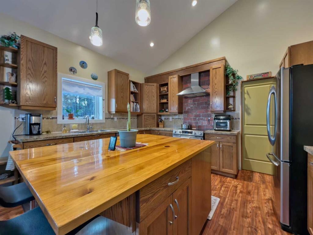 109 Adanac Rise, Hillcrest, AB - Indoor Photo Showing Kitchen With Double Sink