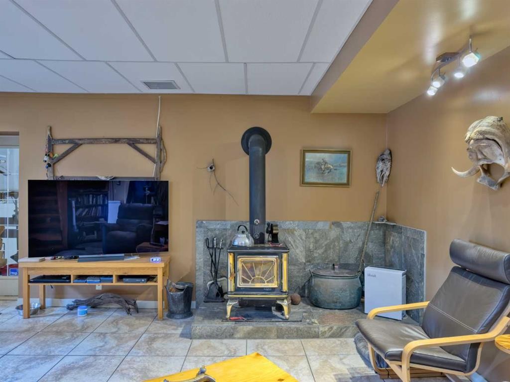 109 Adanac Rise, Hillcrest, AB - Indoor With Fireplace