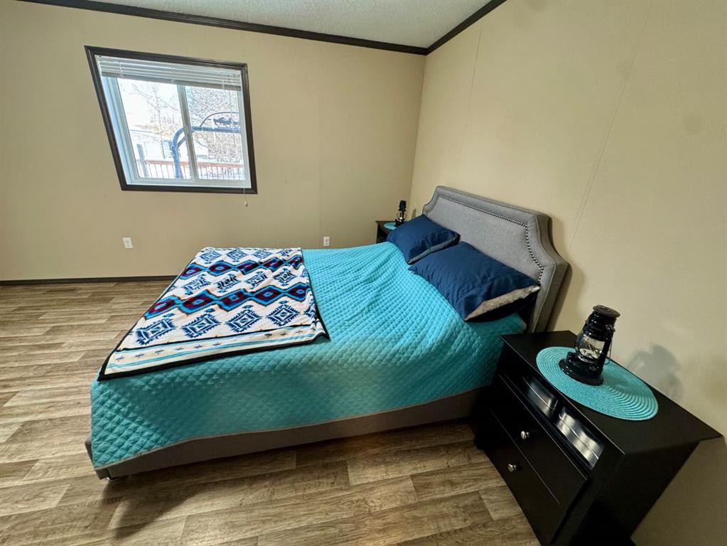 95041A Hwy 2, Fort Macleod, AB - Indoor Photo Showing Bedroom