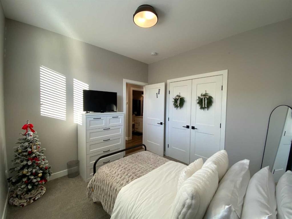 4237 60 Avenue, Taber, AB - Indoor Photo Showing Bedroom
