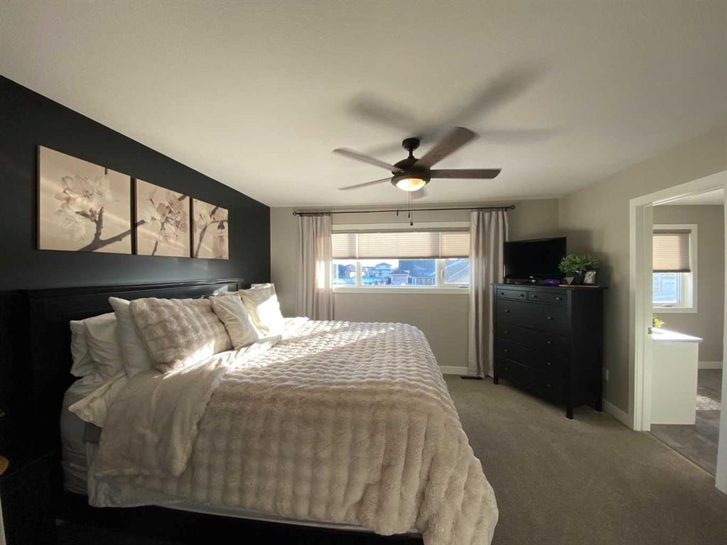 4237 60 Avenue, Taber, AB - Indoor Photo Showing Bedroom