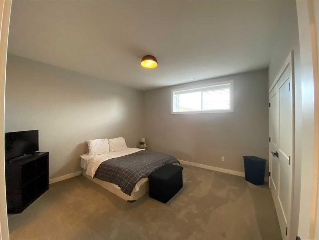 4237 60 Avenue, Taber, AB - Indoor Photo Showing Bedroom