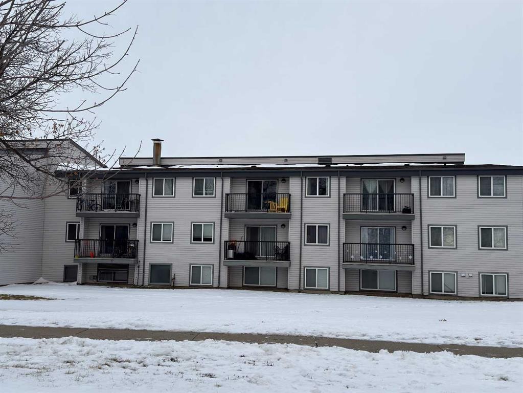 310A-295 Columbia Boulevard West, Lethbridge, AB - Outdoor With Balcony With Facade