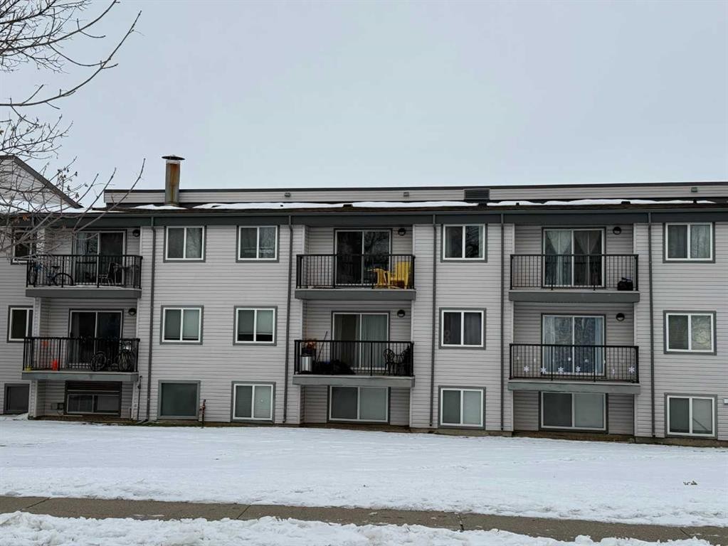 310A-295 Columbia Boulevard West, Lethbridge, AB - Outdoor With Balcony With Facade