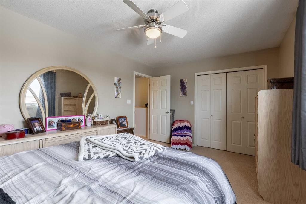 114 Lynx Cove North, Lethbridge, AB - Indoor Photo Showing Bedroom