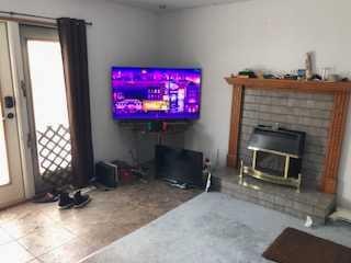 1011 11 Street South, Lethbridge, AB - Indoor With Fireplace