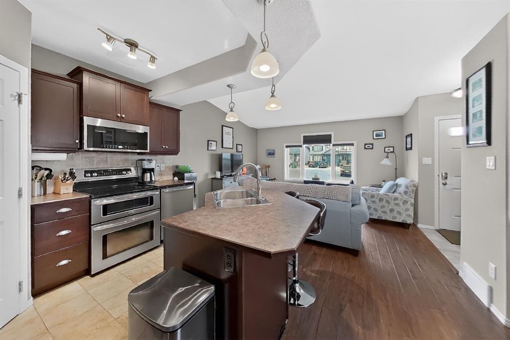 645 Silkstone Point West, Lethbridge, AB - Indoor Photo Showing Kitchen With Double Sink