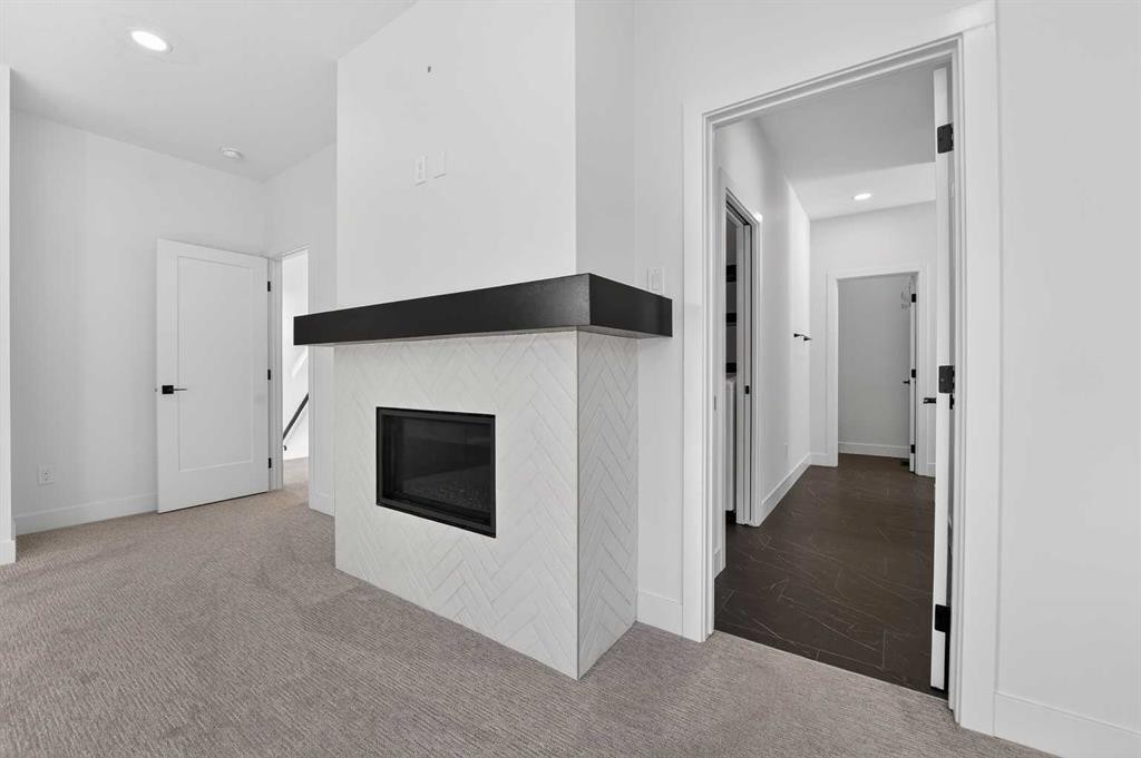 70 Kananaskis Drive, Coleman, AB - Indoor Photo Showing Other Room With Fireplace