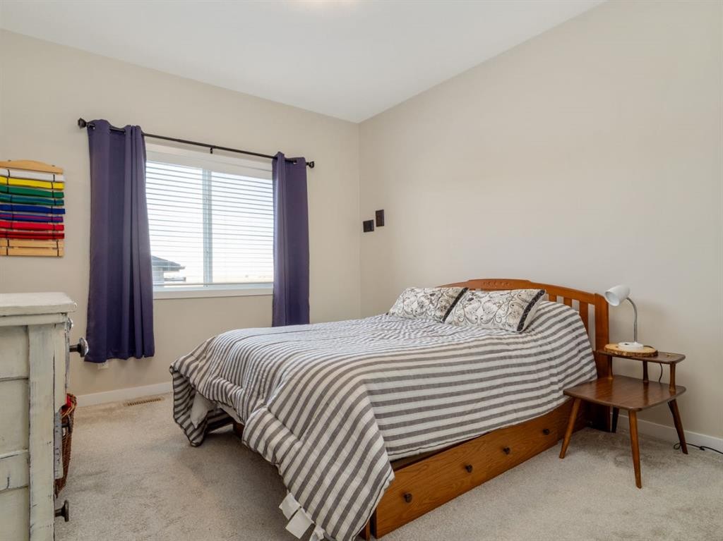 842 Greywolf Run North, Lethbridge, AB - Indoor Photo Showing Bedroom
