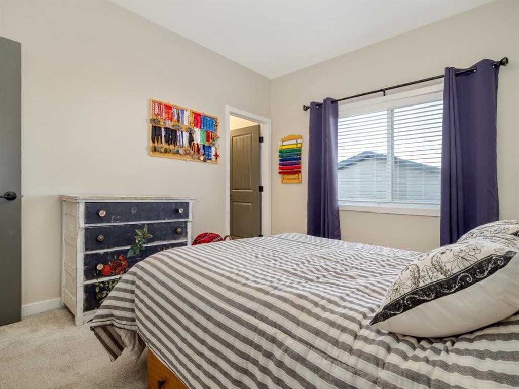 842 Greywolf Run North, Lethbridge, AB - Indoor Photo Showing Bedroom
