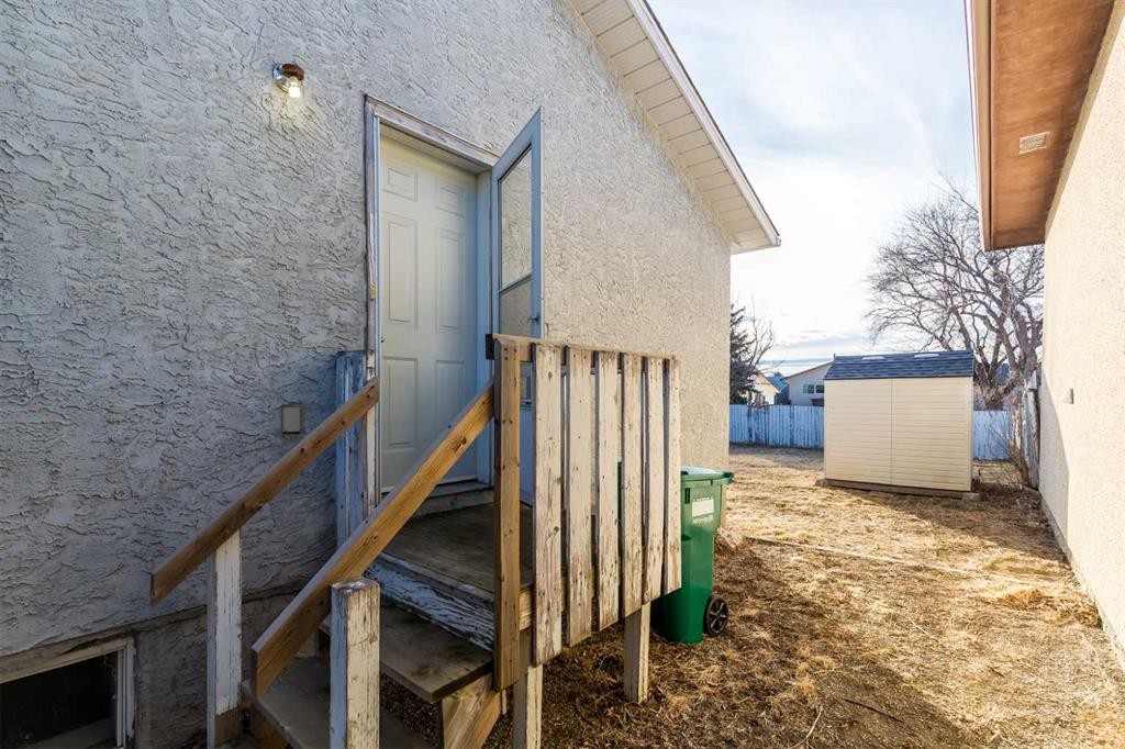 209 Mt Blakiston Road West, Lethbridge, AB - Outdoor With Exterior