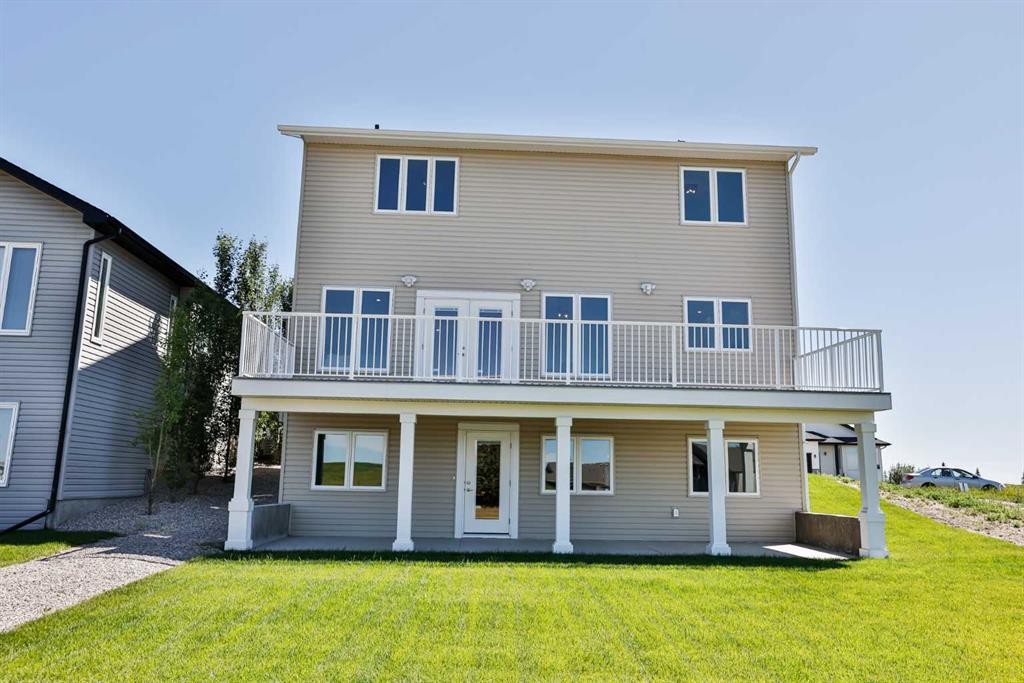 714 Fairways Drive, Vulcan, AB - Outdoor With Deck Patio Veranda With Exterior