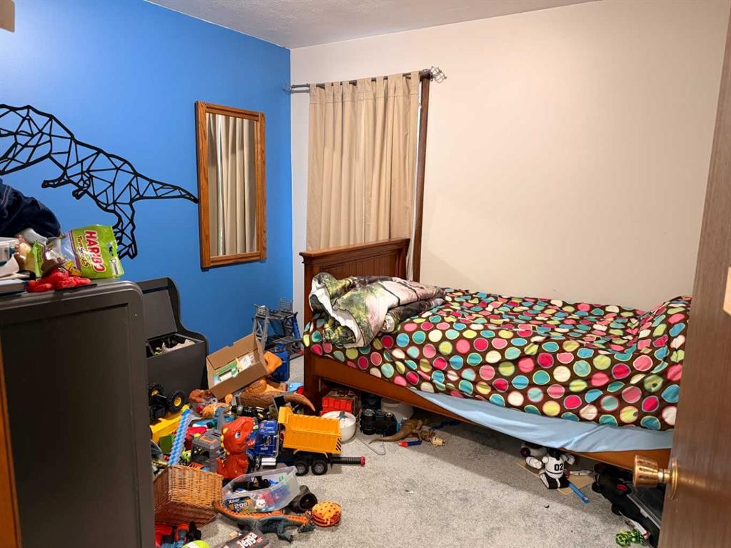 5214 38 Avenue, Taber, AB - Indoor Photo Showing Bedroom