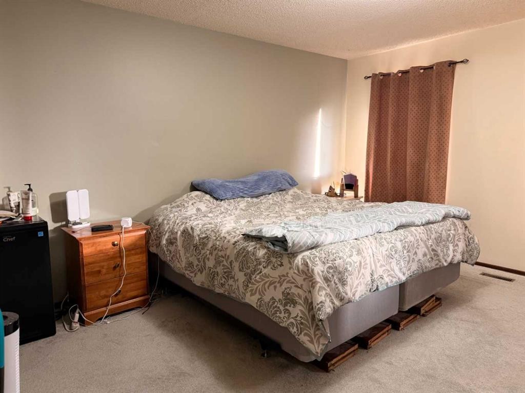 5214 38 Avenue, Taber, AB - Indoor Photo Showing Bedroom
