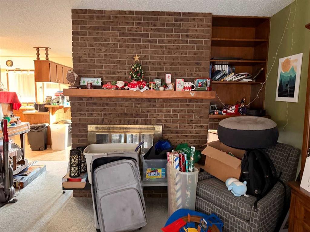 5214 38 Avenue, Taber, AB - Indoor With Fireplace