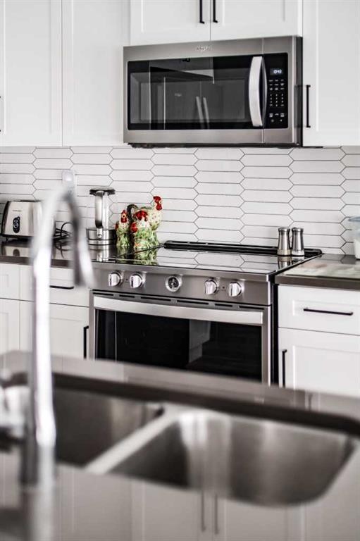 75 Blackwolf Pass North, Lethbridge, AB - Indoor Photo Showing Kitchen With Upgraded Kitchen