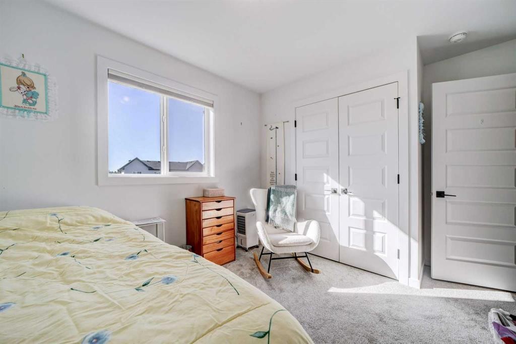 75 Blackwolf Pass North, Lethbridge, AB - Indoor Photo Showing Bedroom