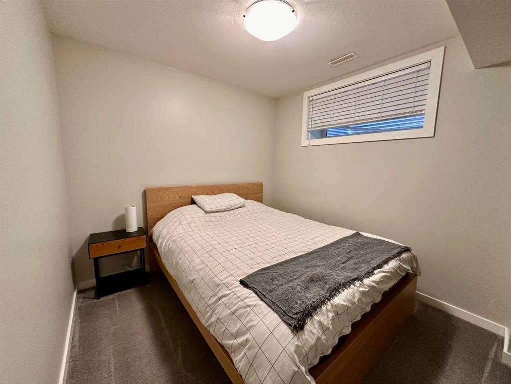 802 Miners Boulevard West, Lethbridge, AB - Indoor Photo Showing Bedroom