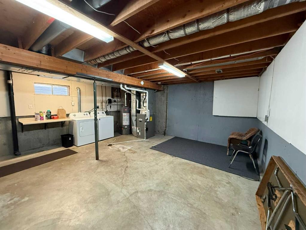 7-65 Lafayette Boulevard, Lethbridge, AB - Indoor Photo Showing Basement