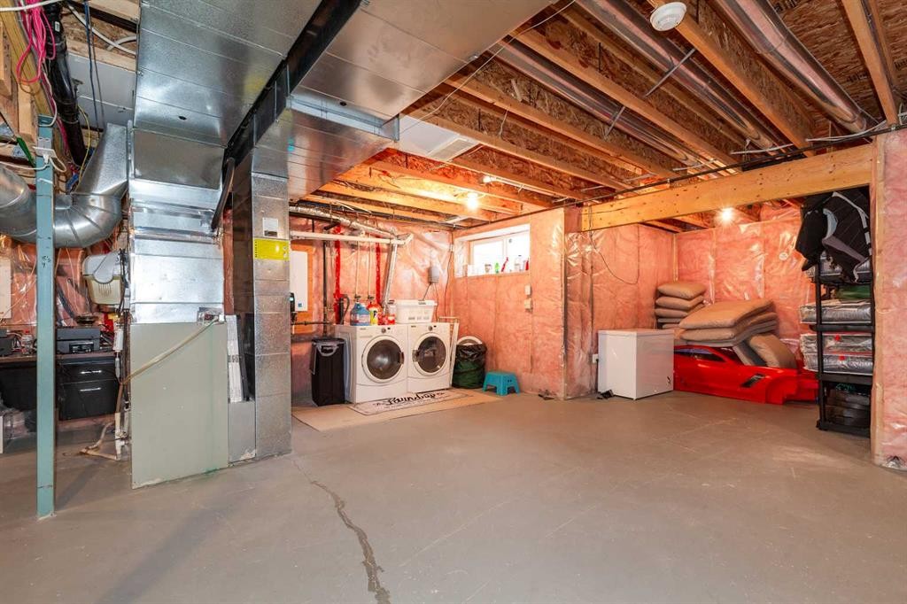 443 Everbrook Way Sw, Calgary, AB - Indoor Photo Showing Basement