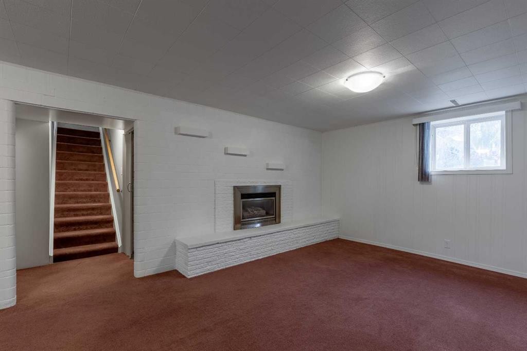 315 Dieppe Boulevard South, Lethbridge, AB - Indoor Photo Showing Other Room With Fireplace