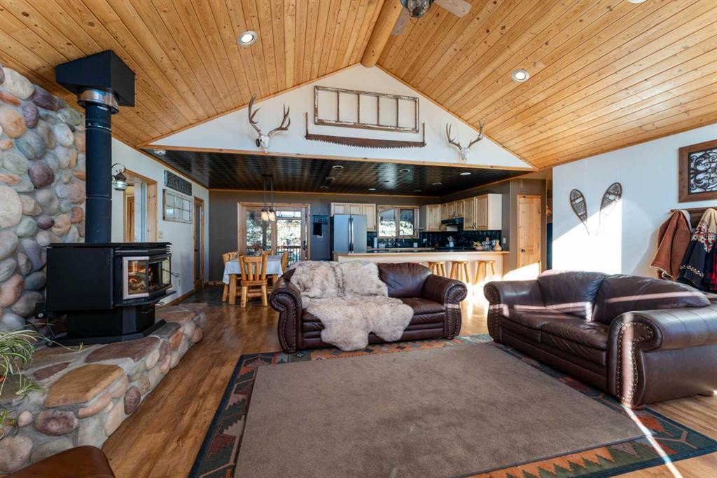 21054 A Range Road 264, Cardston, AB - Indoor Photo Showing Living Room With Fireplace