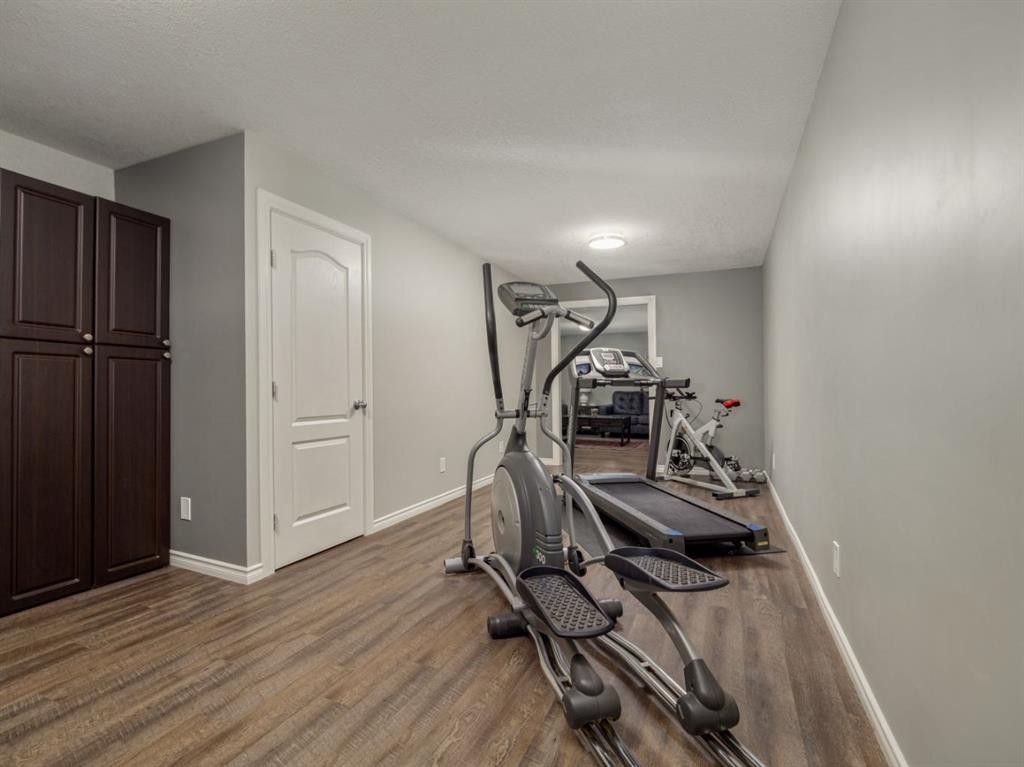 63 Deer Path Meadows, Fort Macleod, AB - Indoor Photo Showing Gym Room