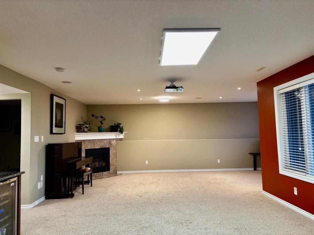 314 Couleesprings Terrace South, Lethbridge, AB - Indoor Photo Showing Other Room With Fireplace