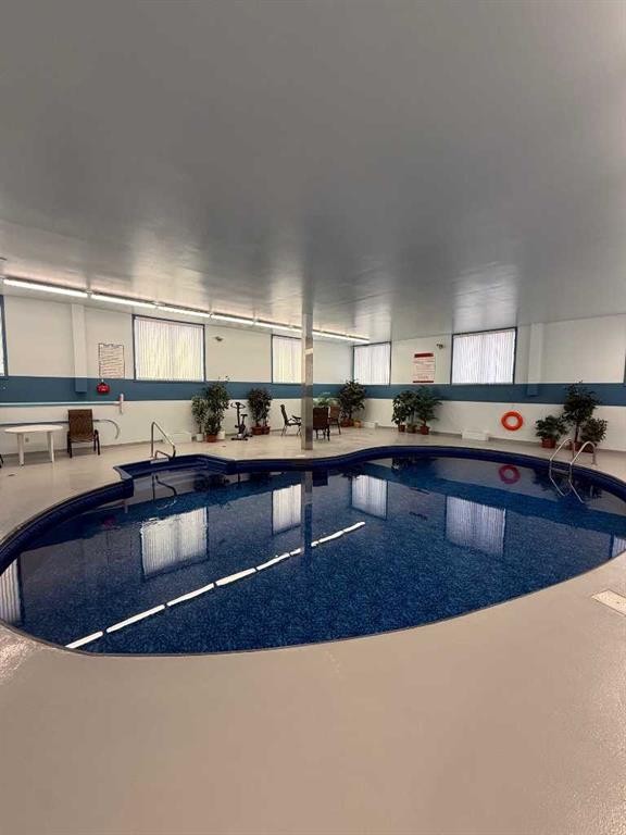 312-75 Temple Boulevard West, Lethbridge, AB - Indoor Photo Showing Other Room With In Ground Pool