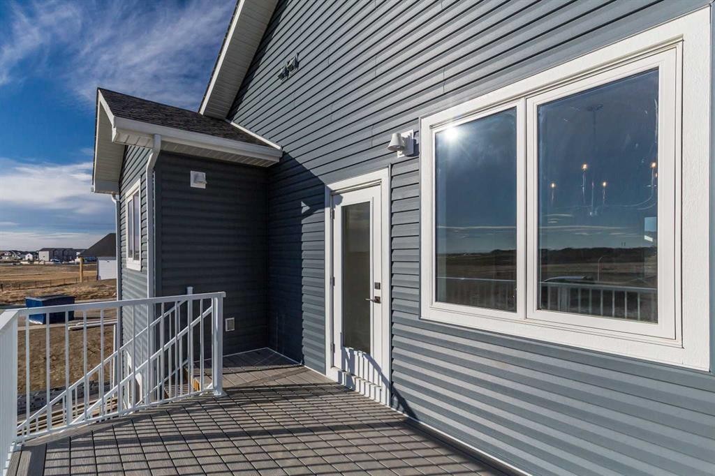 566 Malahat Green West, Lethbridge, AB - Outdoor With Deck Patio Veranda With Exterior