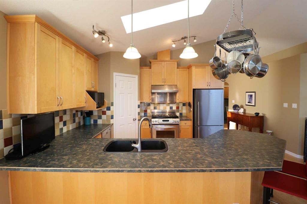 50 Riverbrook Close West, Lethbridge, AB - Indoor Photo Showing Kitchen With Stainless Steel Kitchen With Double Sink