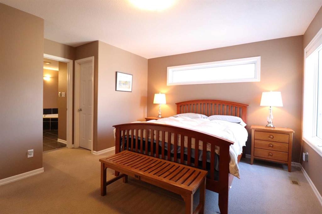 50 Riverbrook Close West, Lethbridge, AB - Indoor Photo Showing Bedroom