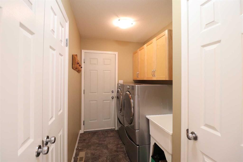 50 Riverbrook Close West, Lethbridge, AB - Indoor Photo Showing Laundry Room