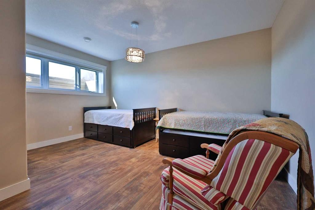 28 Cobblestone Lane, Raymond, AB - Indoor Photo Showing Bedroom