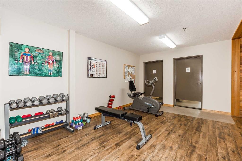 112-75 1 Avenue South, Lethbridge, AB - Indoor Photo Showing Gym Room