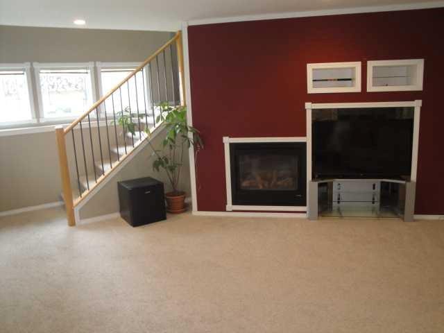 51 Kodiak Boulevard North, Lethbridge, AB - Indoor With Fireplace