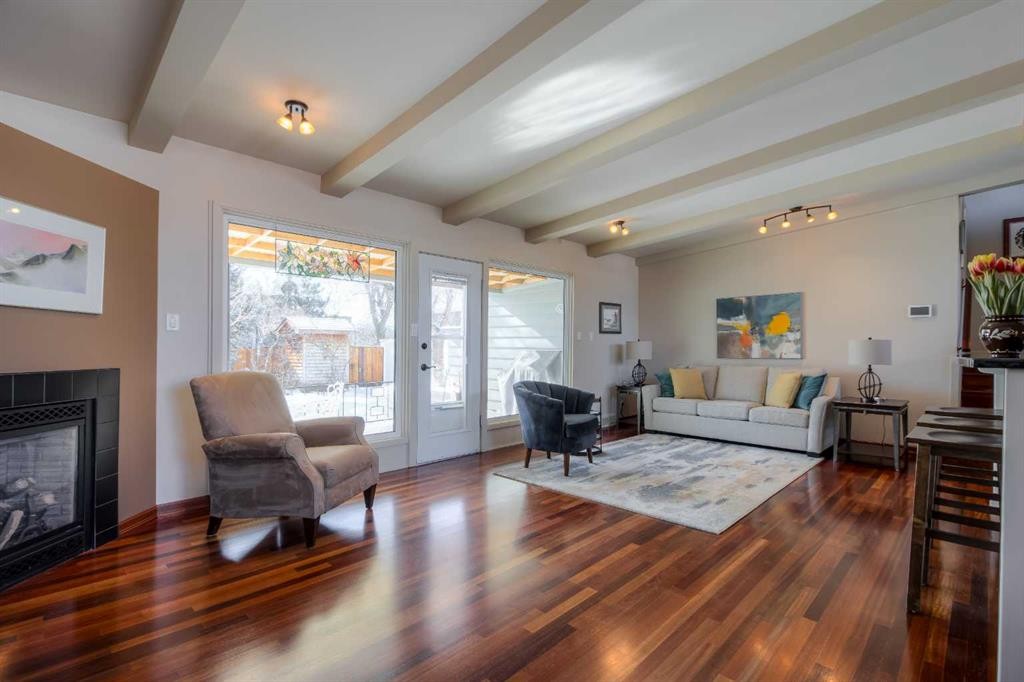 1416 15 Avenue South, Lethbridge, AB - Indoor Photo Showing Living Room With Fireplace