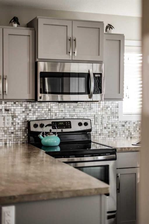 1961 Parkside Way, Coaldale, AB - Indoor Photo Showing Kitchen With Upgraded Kitchen