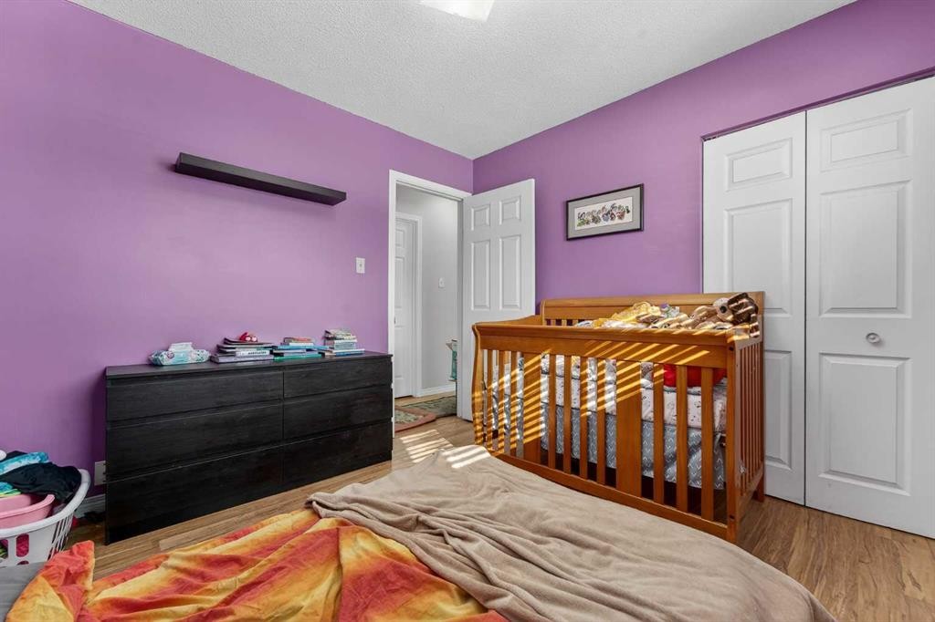 7705 24 Avenue, Coleman, AB - Indoor Photo Showing Bedroom
