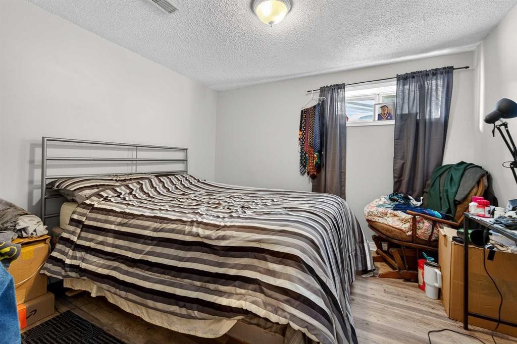 7705 24 Avenue, Coleman, AB - Indoor Photo Showing Bedroom