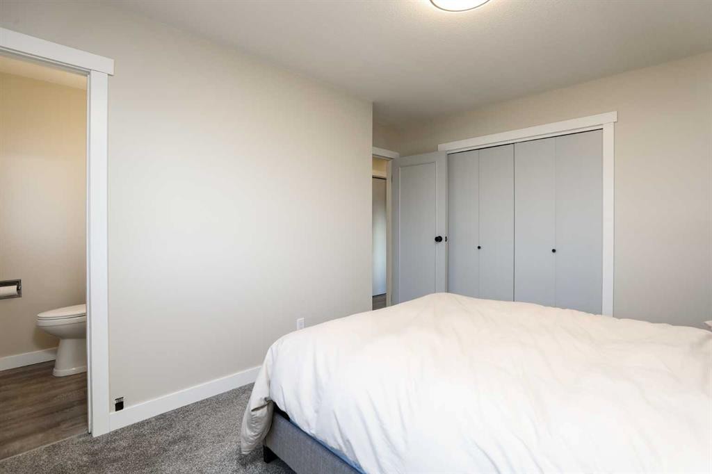 4803 59 Avenue, Taber, AB - Indoor Photo Showing Bedroom