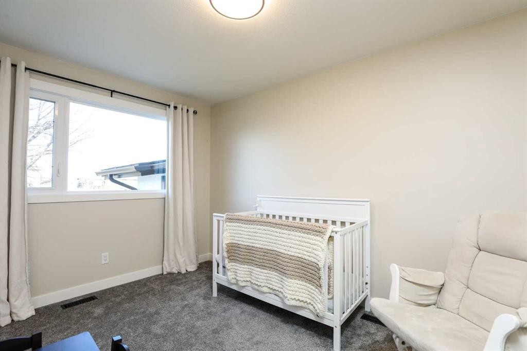 4803 59 Avenue, Taber, AB - Indoor Photo Showing Bedroom