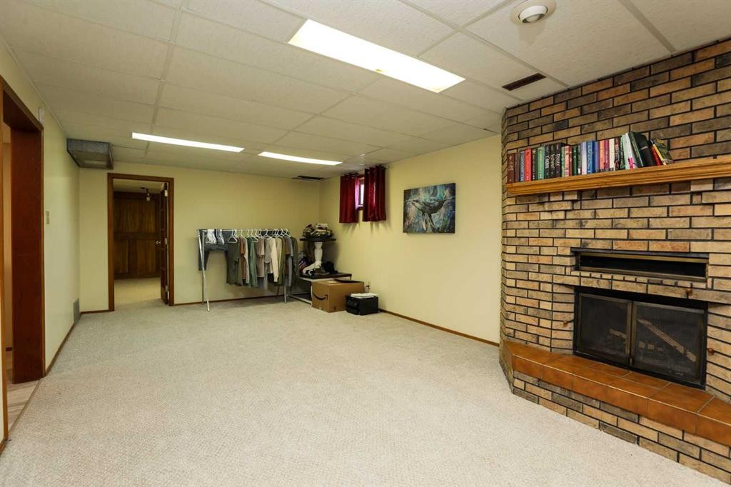 4803 59 Avenue, Taber, AB - Indoor With Fireplace