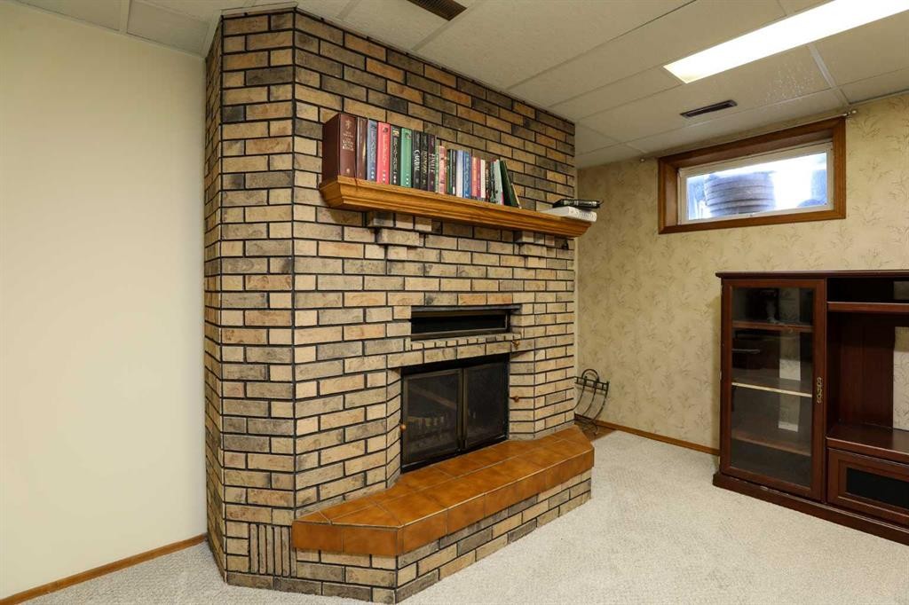 4803 59 Avenue, Taber, AB - Indoor With Fireplace