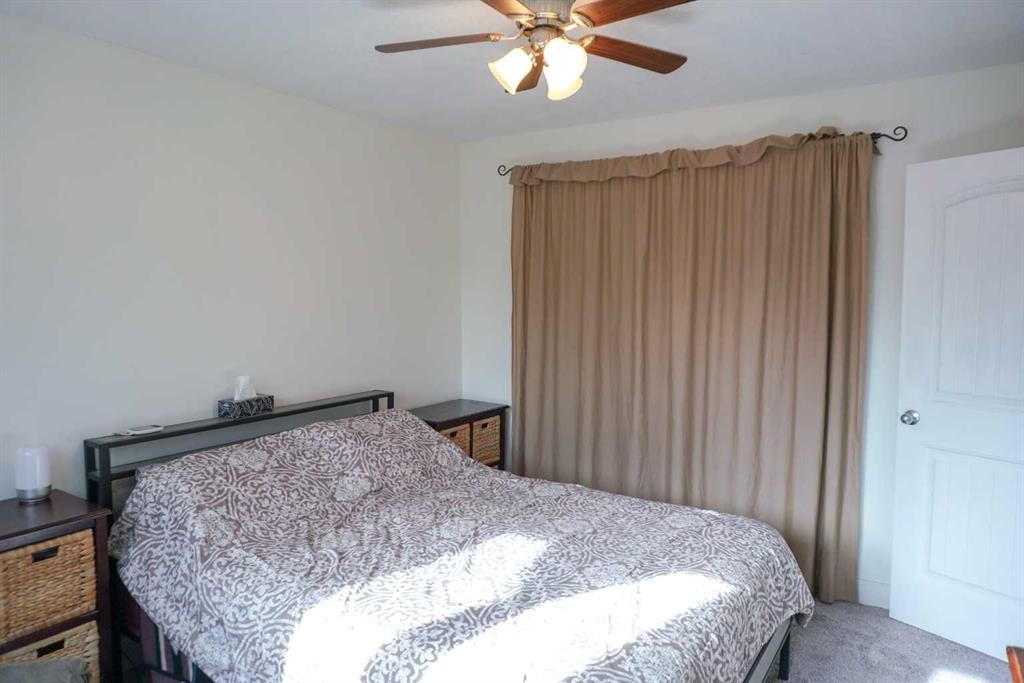 206 Mcgill Boulevard West, Lethbridge, AB - Indoor Photo Showing Bedroom